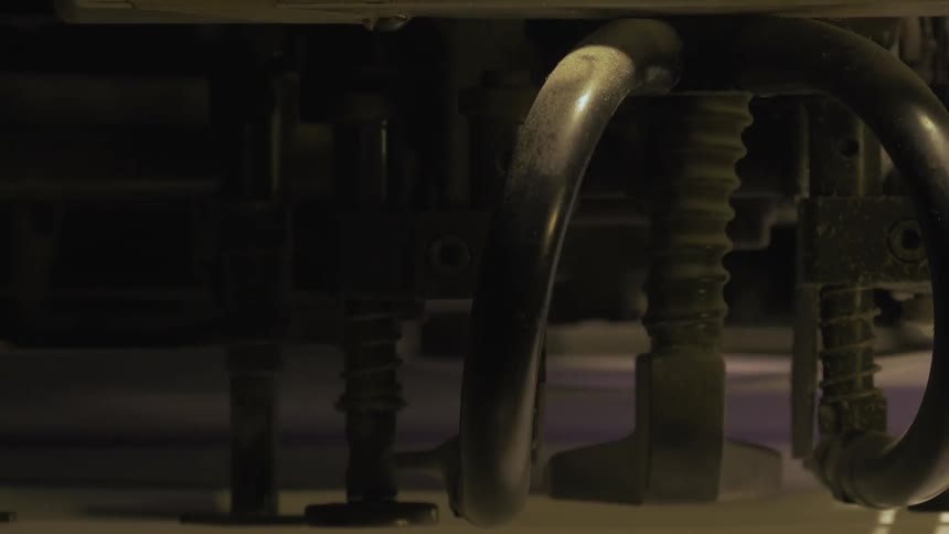 A machine is punching papers fast