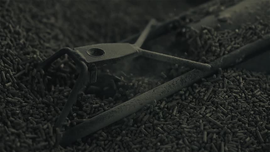 Grain is being poured into a container