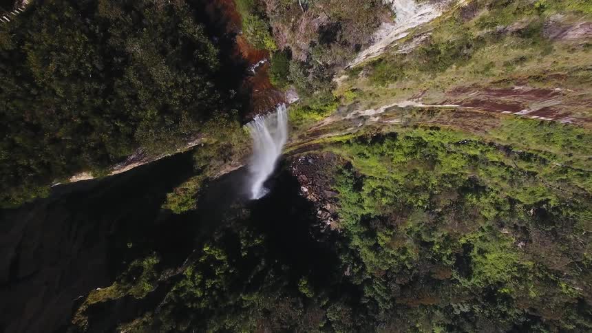 Aerial view of a waterfall and cliffs