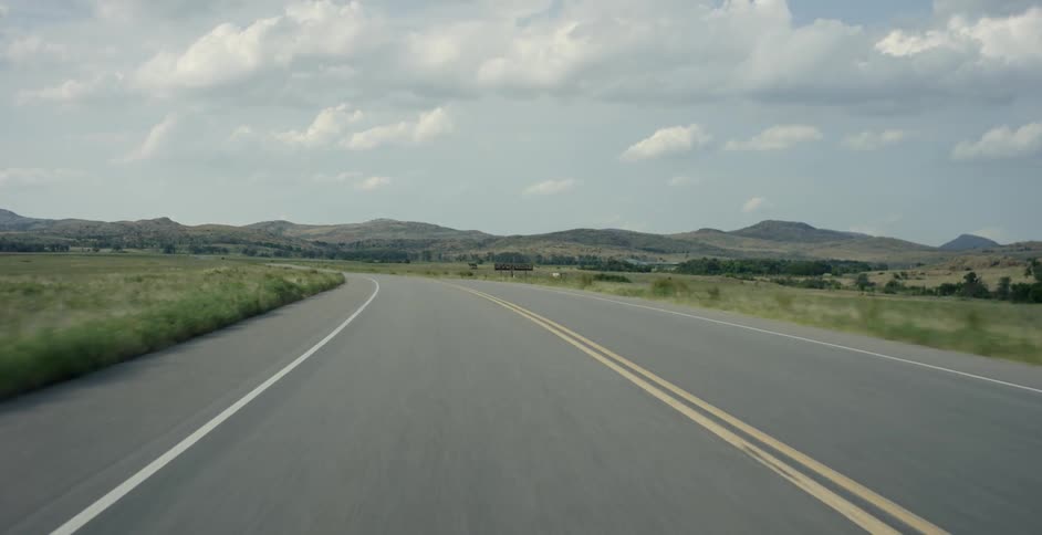 The road is long and the clouds are thick above