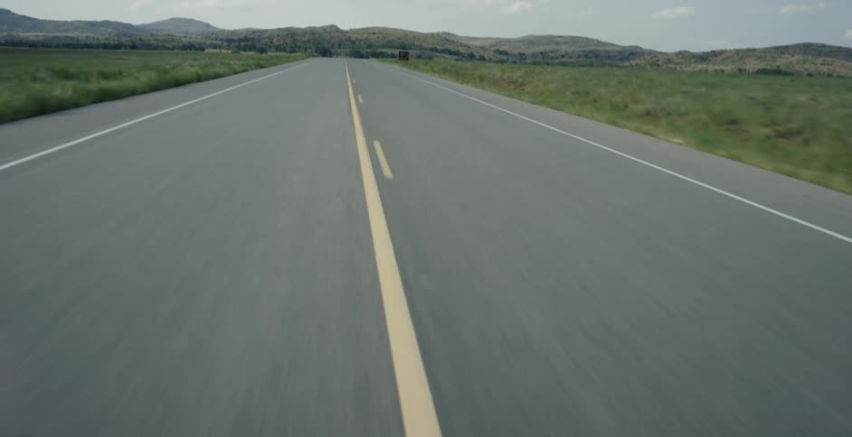 Moving down a small road on a cloudy day