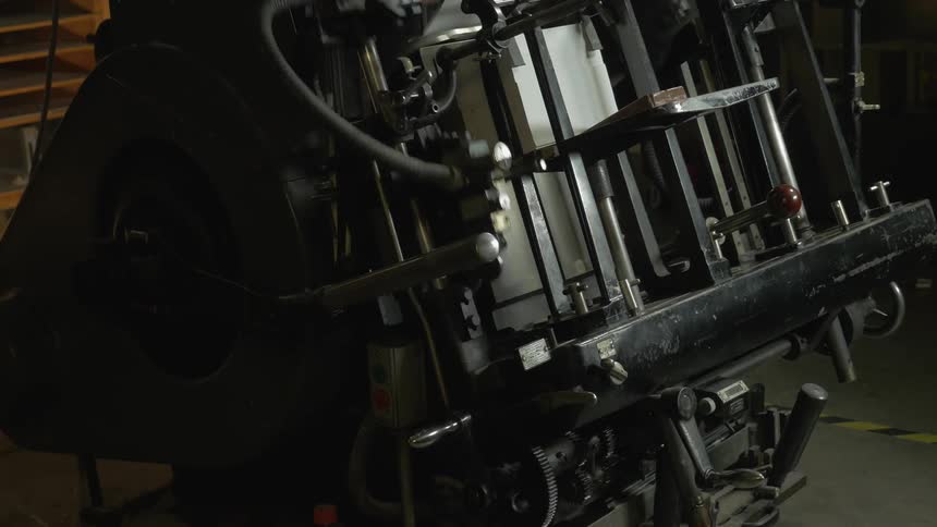 A metal machine moves up and down