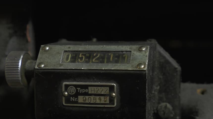 The counter on the machine slowly changes numbers