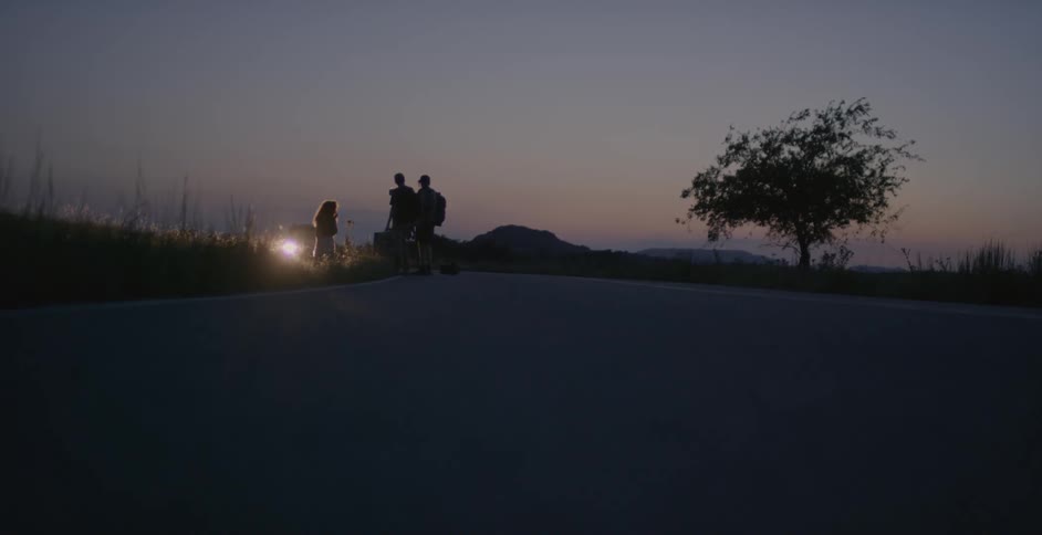 People are talking together ahead at dawn