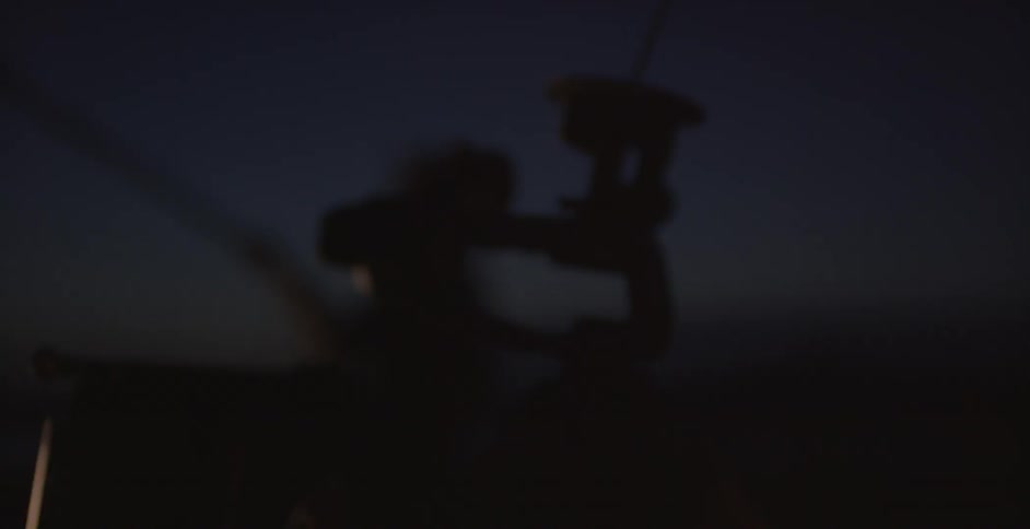 Man records with camera equipment in the dark