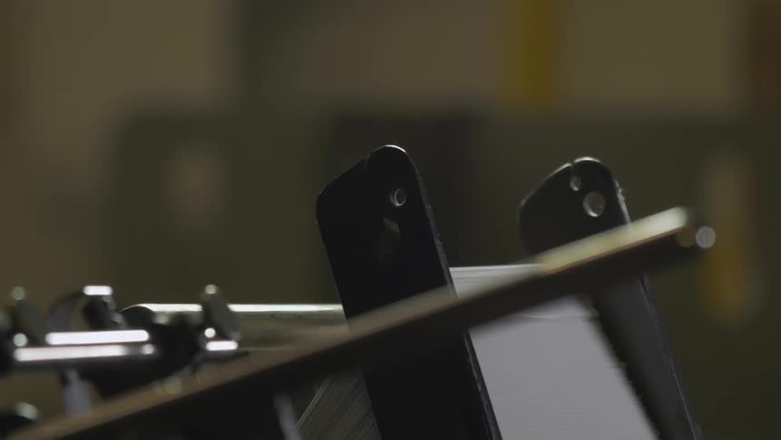 A machine sorts paper