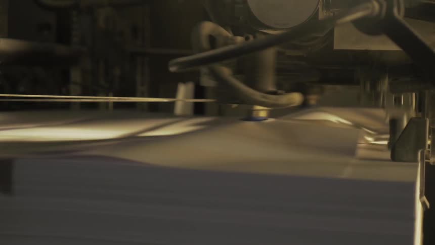 Machine flipping white paper quickly