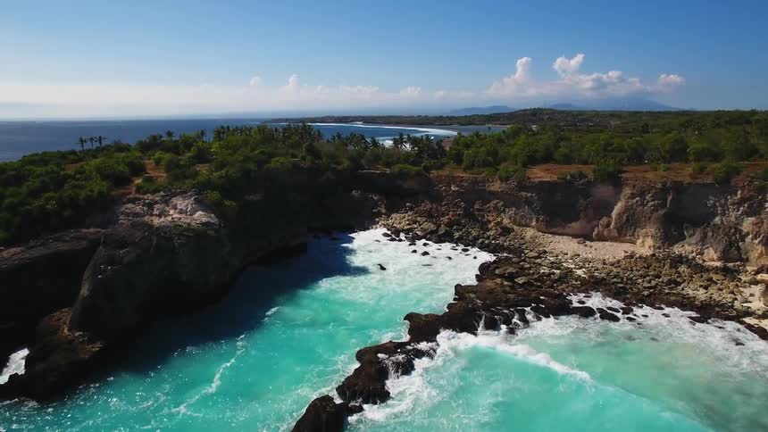 The waters near the shore are very blue