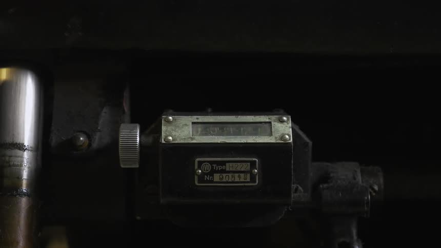 A counter on a machine counts as the machine works