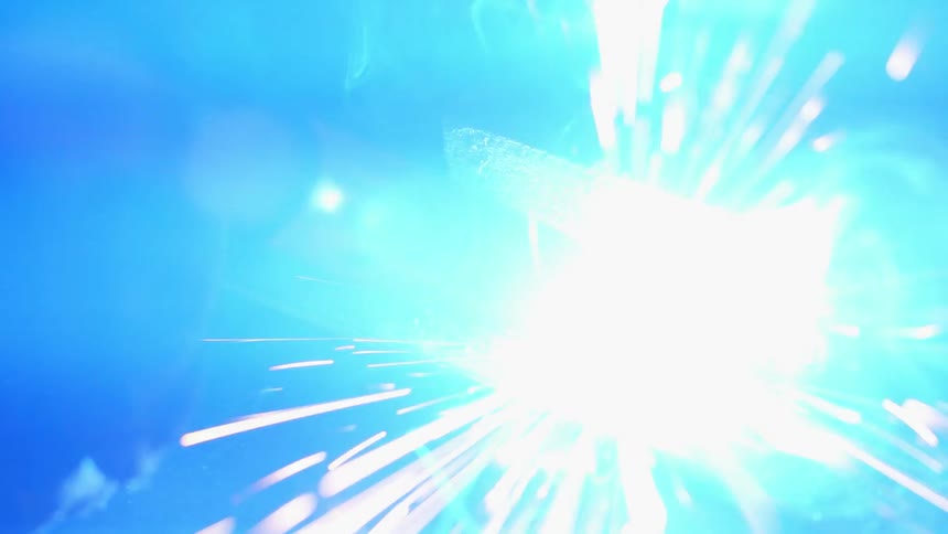 Welder causing sparks and light