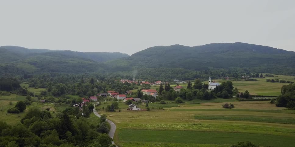 View of a small village near some mountains