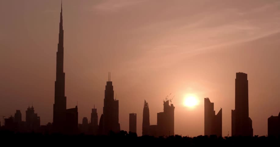 Large city of skyscrapers at sunset