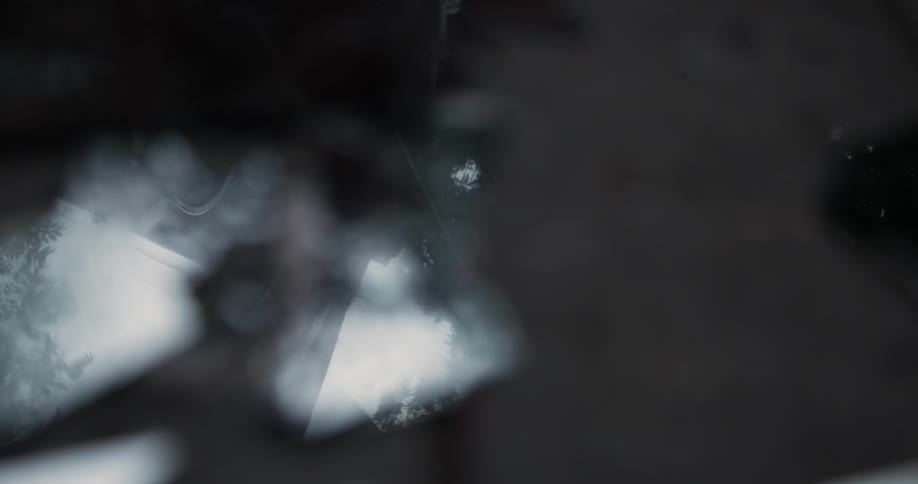 Holes in the wall show people moving outside