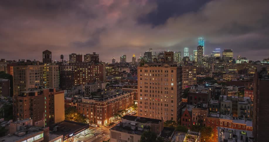 A busy, well lit city at night