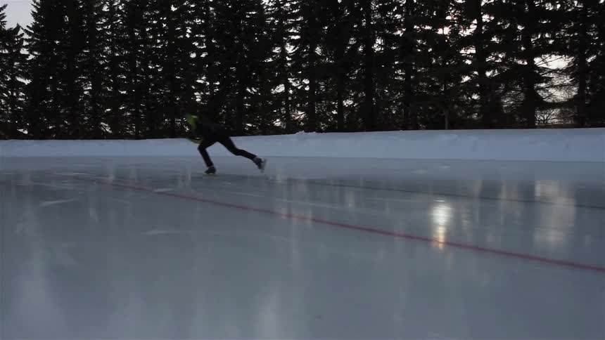 People are racing skating across the ice