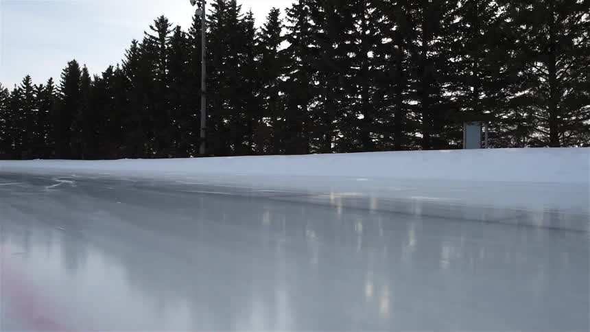 The long road is covered in a sheet of ice