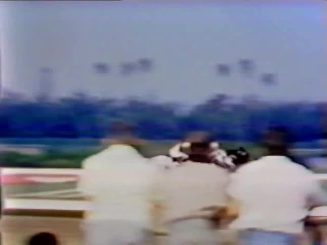 People watch a horse race