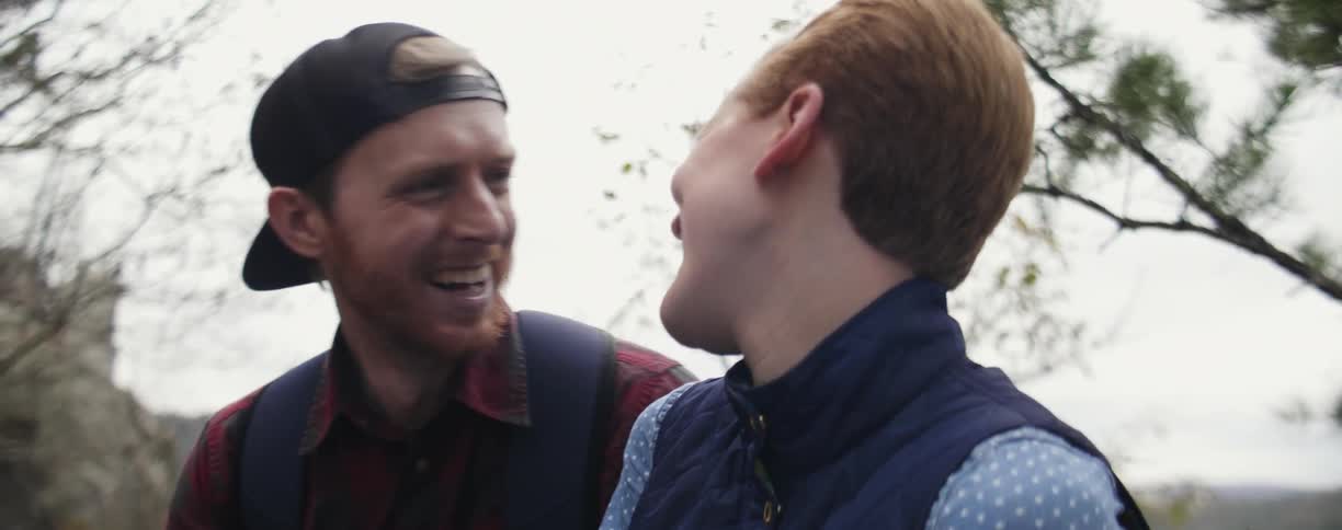 Couple talking and laughing outdoors