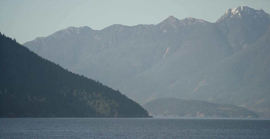 The waves are relaxed near the mountain