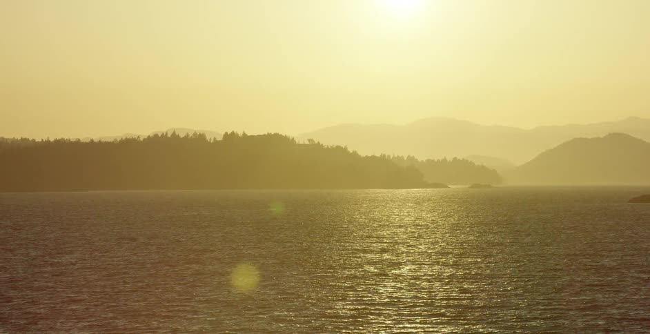 A lake is seen at sunset
