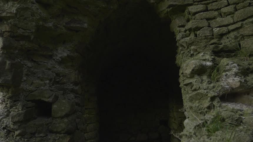 Close up of a cave in a stony rock formation