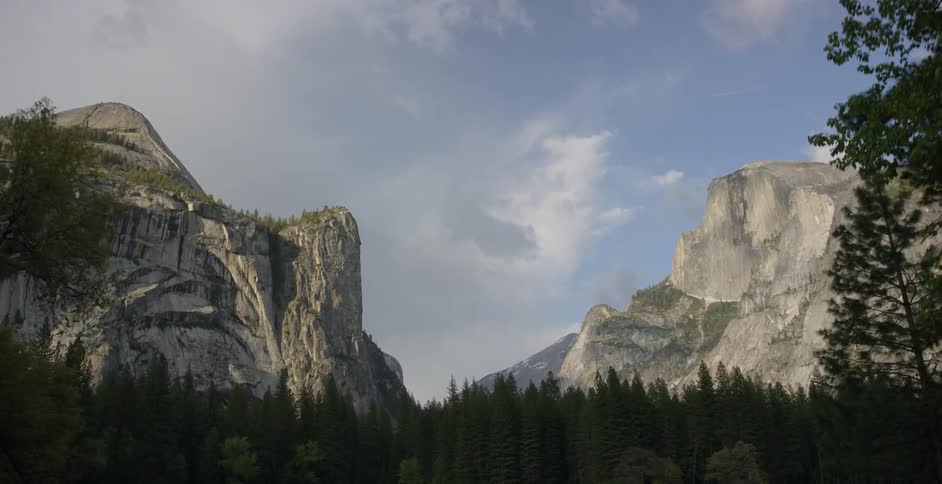 A view of trees and large mountainous rocks