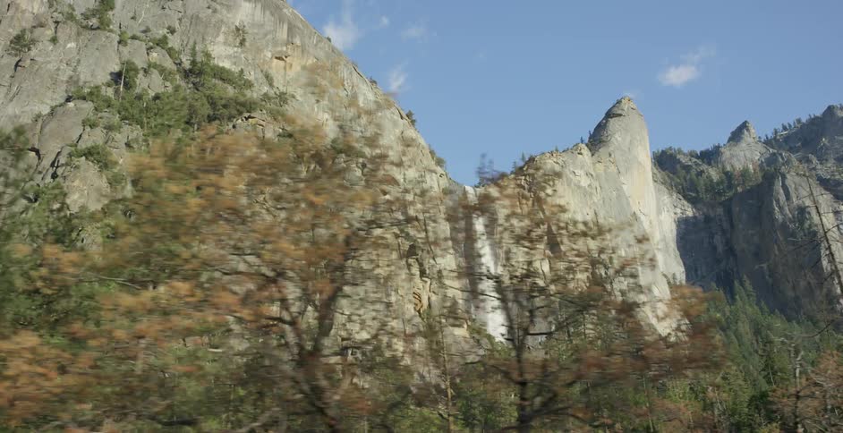 Waterfall splashing off of a tall cliff