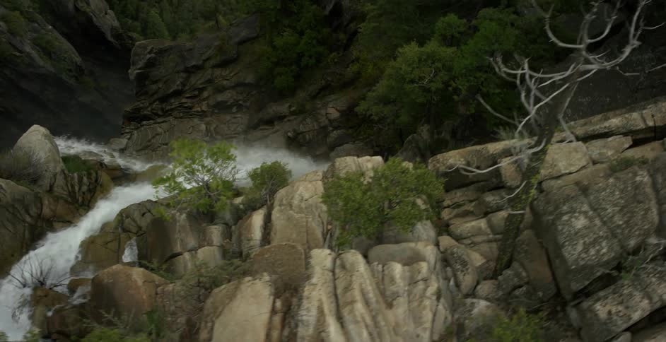 Water splashing off a rocky cliff