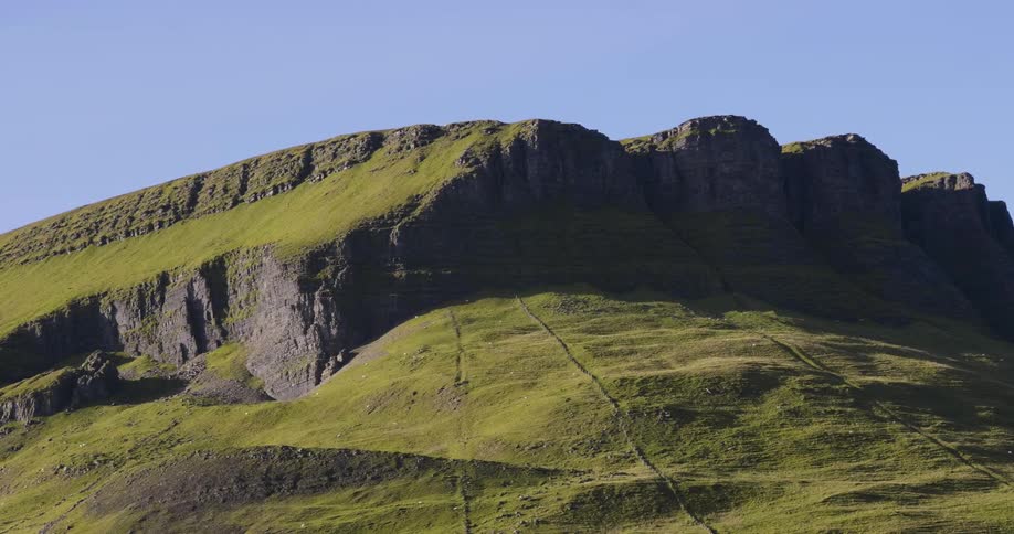 Grassy hilly landscape on a clear day