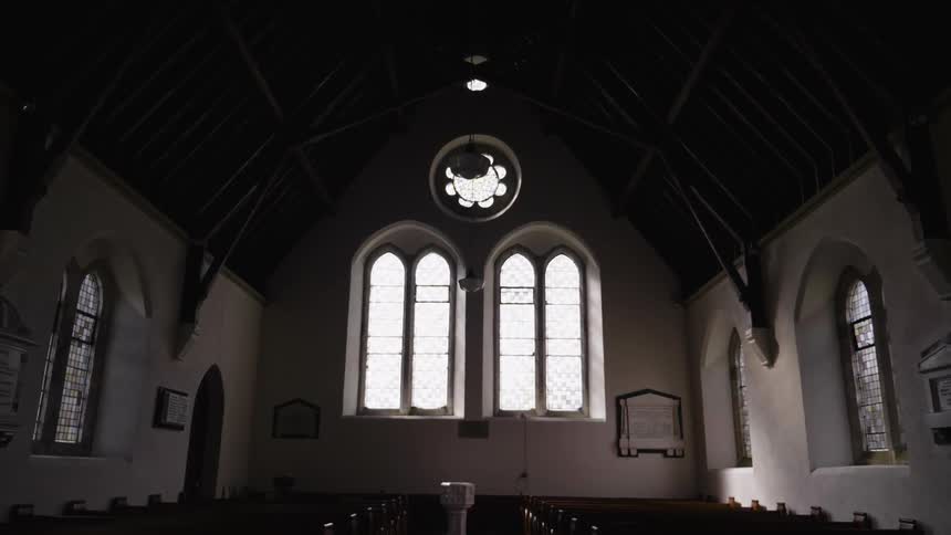 Sunlight illuminates the interior of a church during the day