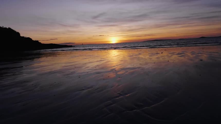 View of a large body of water at sunset