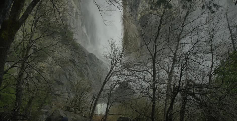 A waterfall is heavy pouring water down the mountain