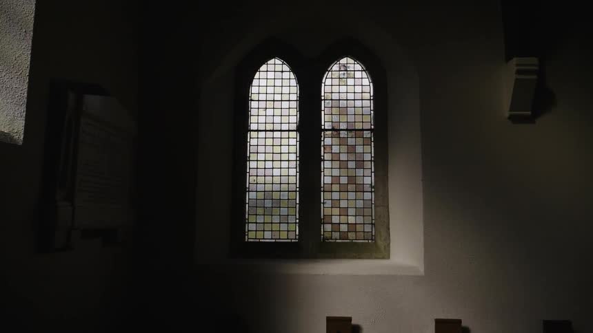 The windows in the church have stained glass