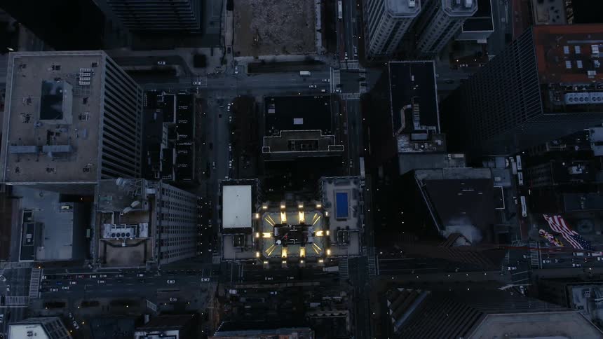 Aerial view of buildings and streets at night