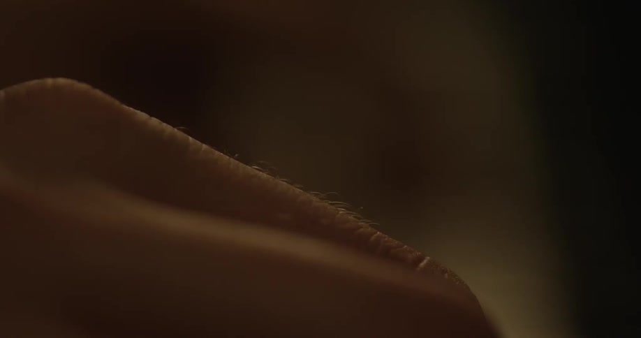 Extreme close-up of hands playing a piano