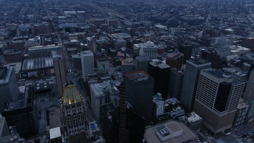 Aerial view of a large city at sunset