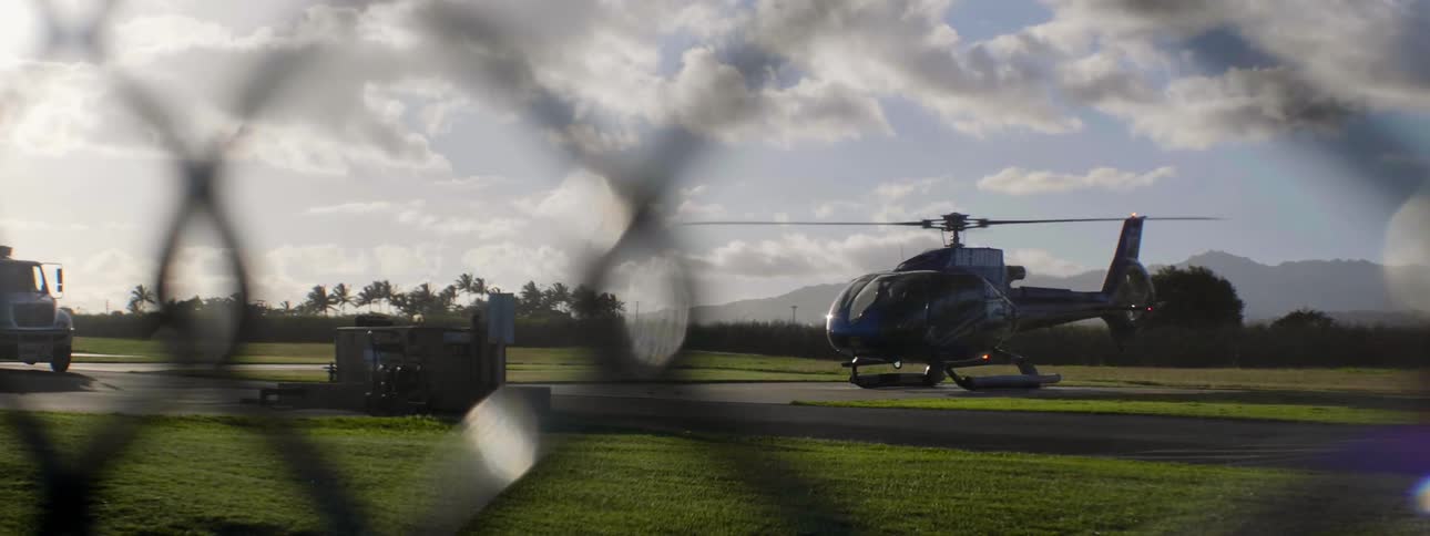 A helicopter turns on beginning take off