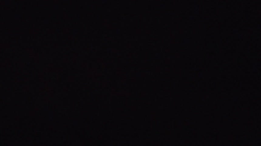 Lighting flashing in a storm cloud at night