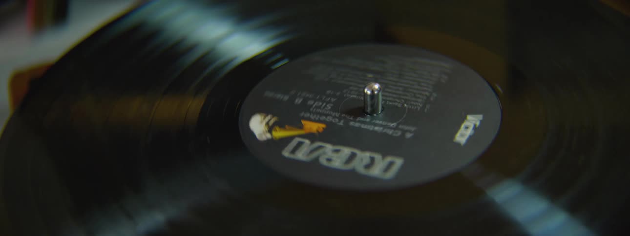 A record slowly starts spinning