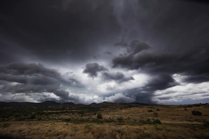Storm clouds darken and move over the landscape