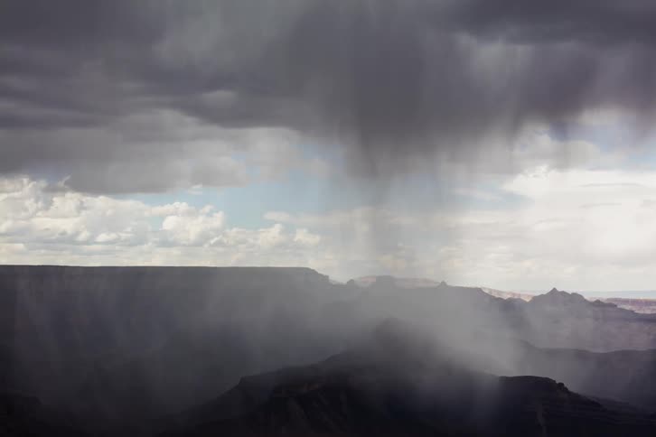 Fog covers a canyon as a storm rolls in