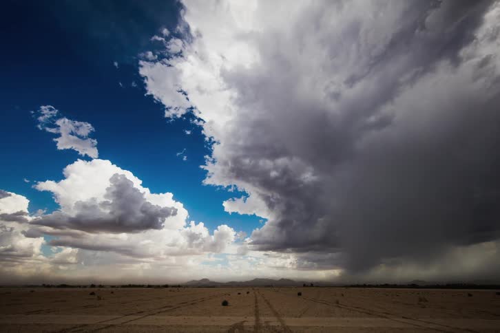 Clouds roll over flat plains