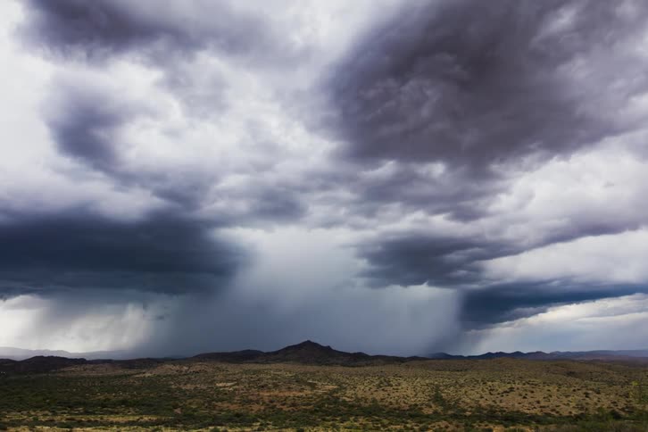 Rain clouds moving over plains