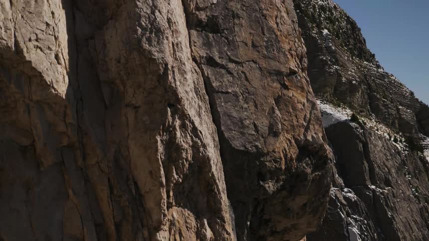 Close up view of a tall cliff