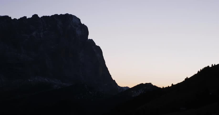 A rock formation towards into the dusk sky