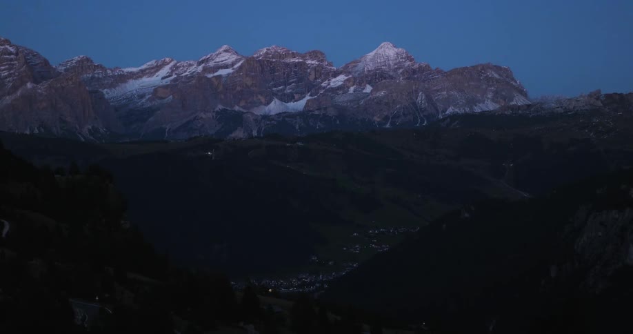 View of snowy mountains at sunset