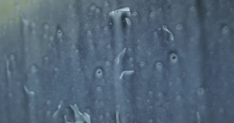 Liquid sprays on a window
