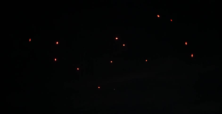 Lights blinking in the night sky