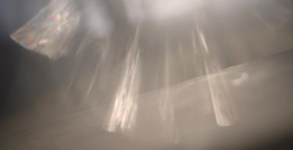 Sunlight reflecting off of a shiny surface