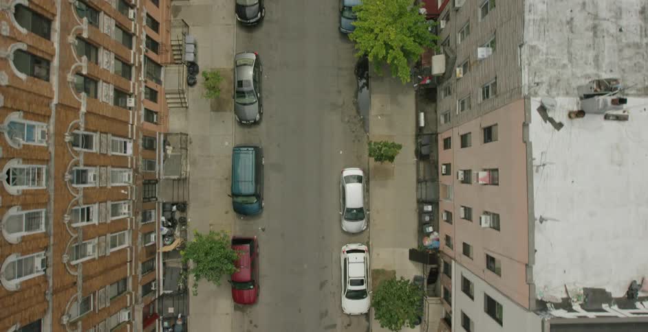 Overhead view of cars parked on a city street